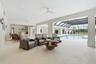 4000 sq ft lanai with covered areas, bar, & outdoor kitchen