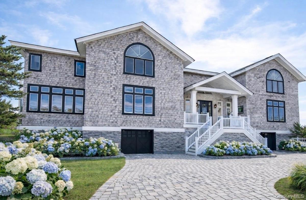 ARTIST RENDERING Changing Stucco to Grey Cedar Shake, Black Trimmed Window Frames & Garage Doors, Paver Driveway, & Landscape.