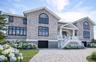 ARTIST RENDERING Changing Stucco to Grey Cedar Shake, Black Trimmed Window Frames & Garage Doors, Paver Driveway, & Landscape.