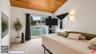 The primary suite features vau