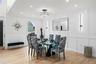 HUGE FORMAL DINING ROOM with custom millwork and lighting