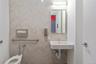 Bathroom with a sink and toilet