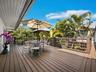 A large al fresco dining area takes advantage of the privacy to provide that true island lifestyle for your families meals.
