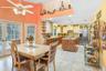 Large Eat-in Kitchen with French doors leading out to pool/patio area with vaulted ceilings.