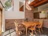 dining room with wood stove
