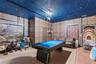 Garage has been converted into a semi play area.