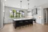 The large island has room for seating and lots of prep space for cooking and entertaining.