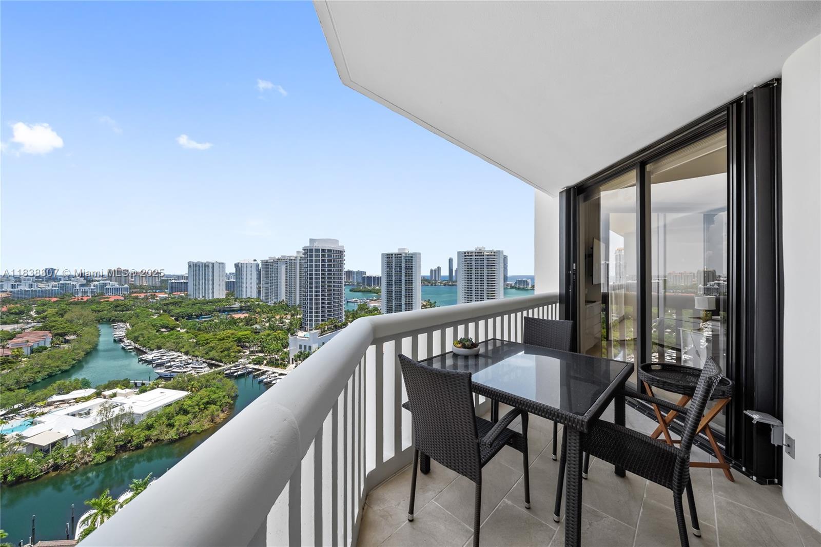 North balcony facing the Island Club, the Club House, the tenis courts, Sunny Isles skyline, Hardrock Stadium, you can also see Fort Lauderdale Downto