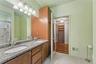 Master ensuite bath with double vanity with granite countertop and dual undermount sinks