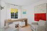 Office area with wood finished floors and baseboards
