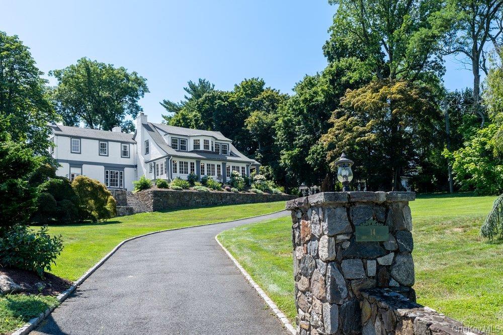 Luxury living overlooking the golf course in a grand colonial, where light and space elevate every moment