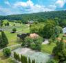 Tennis/basketball court next to guest house.