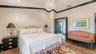 Primary suite with elegant finishes