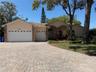 Beautiful facade with architectural details and 3 car garage.