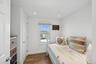 Bedroom featuring recessed lighting and dark wood-type flooring