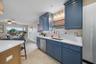 Open concept to the dining room and easy access to the outdoor deck