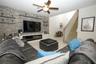 Great room / Custom built entertainment center / electric fireplace