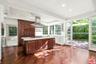Sunny kitchen opening to a bea