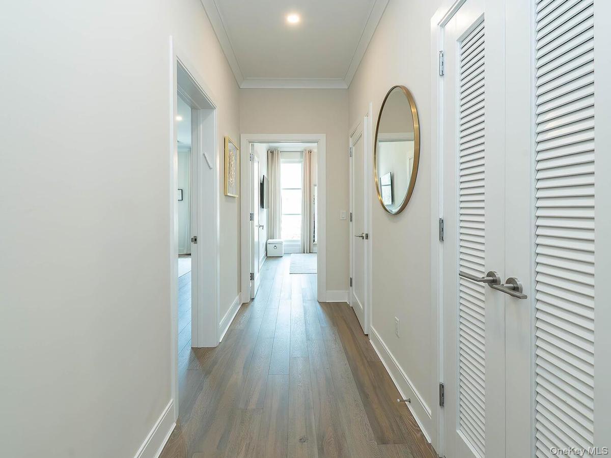 The bedroom corridor is thoughtfully set apart, ensuring a distinct separation from the main living area for added privacy and tranquility