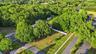Aerial View of Front Entrance & Fully Fence Grounds
