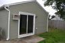 1BR unit sliding doors to yard