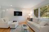 Living room with recessed lighting and light wood finished floors