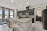 Kitchen with island and breakfast dining area