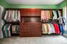 Custom walk-in closet with additional shoe closet