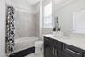 Bath with tub and shower