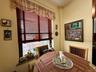 Eat in kitchen area, with large window in the corner of the building, great for ventilation