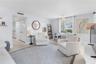 Living Room view from front door with Swivel Chairs