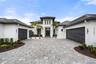 This home is the epitome of refined Florida living, blending modern architecture and elevated designer finishes with exceptional craftsmanship and att