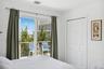 Bedroom with a closet and visible vents
