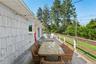 Wooden terrace featuring outdoor dining space