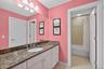 Shared full bathroom with bedroom #2 and main hallway access