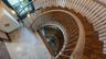 Custom spiral staircase with artisan ironwork