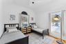 Bedroom featuring  wood flooring,  and ceiling fan