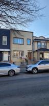 View of front of house featuring stucco siding