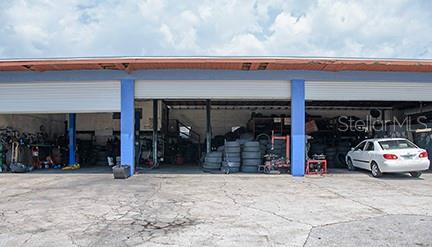 3 large overhead garage doors