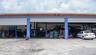 3 large overhead garage doors