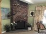 Primary bedroom with fireplace