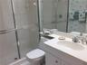 Guest bath is nice and bright for guest to shower after enjoying a hot day on the golf course!