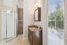 The same bathroom showing the walk in shower.