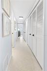 Hallway from Living Room to Bathroom and Primary Bedroom