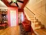 Main entrance on the 9th floor, hardwood floors, coat closet, storage under stairs, open to the dining area
