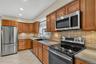 Well-appointed kitchen offers ample workspace and a comfortable layout for everyday cooking and entertaining.