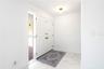 Walk in front door. Notice the beautiful new white tiles.