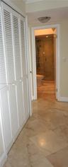 foyer to the second bathroom and lot of closet.