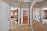 The entry for unit #1, centrally located and providing access all areas of the unit.