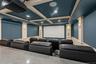 Cinema featuring crown molding, a decorative wall, recessed lighting, and beamed ceiling